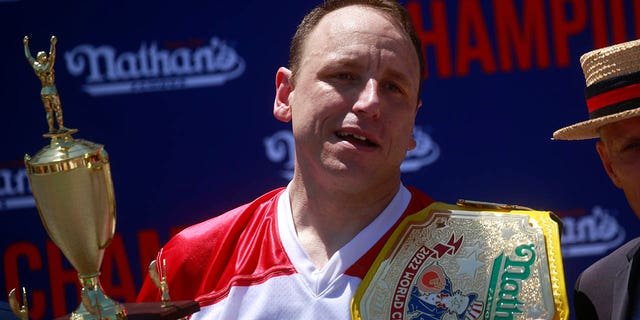 Joey Chestnut reacts after winning first place, eating 63 hot dogs in 10 minutes, during the 2022 Nathans Famous Fourth of July International Hot Dog Eating Contest on July 4, 2022 in the Brooklyn borough of New York City.