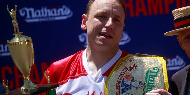 Joey Chestnut reacts after winning first place, eating 63 hot dogs in 10 minutes, during the 2022 Nathans Famous Fourth of July International Hot Dog Eating Contest on July 4, 2022 in the Brooklyn borough of New York City.