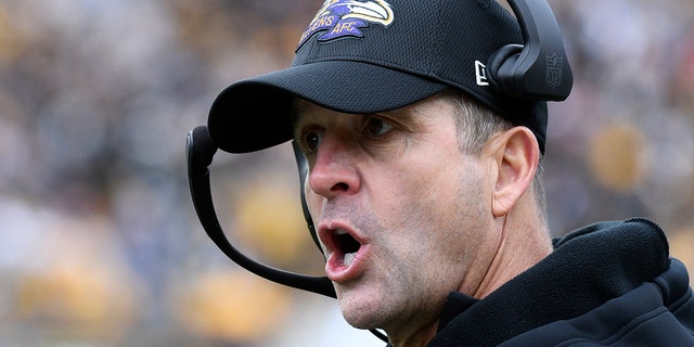 Baltimore Ravens head coach John Harbaugh yells instructions from the sidelines during the first half of an NFL football game against the Pittsburgh Steelers in Pittsburgh, Sunday, Dec. 11, 2022. 