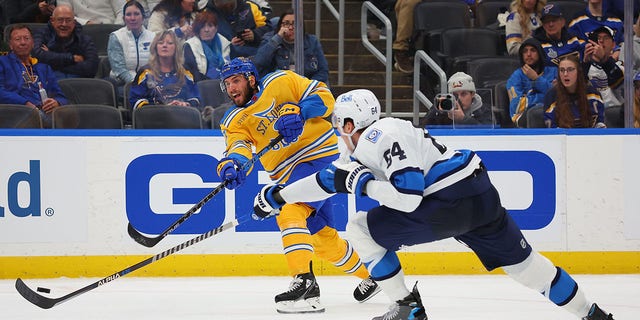 ST LOUIS, MO - DECEMBER 8: Josh Leivo, #17 of the St. Louis Blues, shoots the puck against the Winnipeg Jets in the third period at Enterprise Center on December 8, 2022, in St Louis, Missouri.