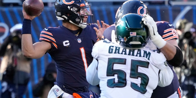 Justin Fields of the Bears passes against the Philadelphia Eagles, Sunday, Dec. 18, 2022, in Chicago.