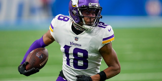 Justin Jefferson of the Minnesota Vikings runs during the first half of an NFL football game against the Detroit Lions on Sunday, December 11, 2022, in Detroit.