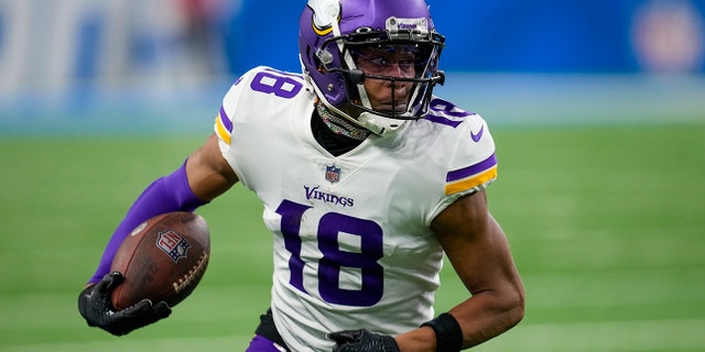 Justin Jefferson of the Minnesota Vikings runs during the first half of an NFL football game against the Detroit Lions on Sunday, December 11, 2022, in Detroit. 