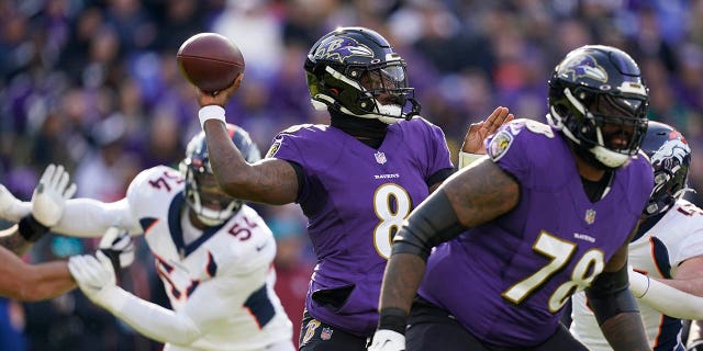 Ravens quarterback Lamar Jackson looks to pass against the Denver Broncos, Sunday, December 4, 2022, in Baltimore.