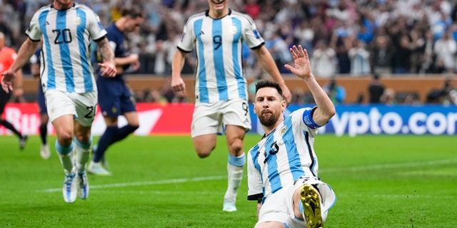 Argentina's Lionel Messi celebrates scoring his side's opening goal during the World Cup final match against France at the Lusail Stadium in Lusail, Qatar, Sunday, Dec.18, 2022.