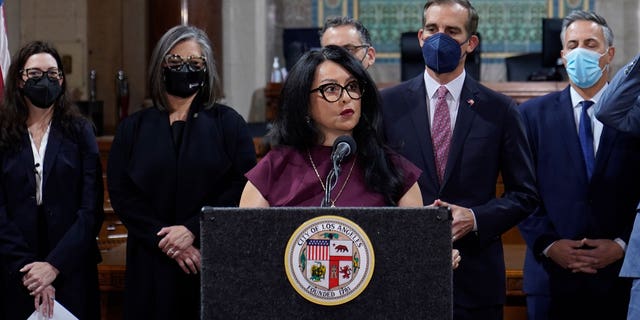 Los Angeles City Council Speaker Nury Martinez on the podium and Mayor Eric Garcetti standing to his right are seen during a press conference at Los Angeles City Hall in Los Angeles on 1 April 2022.