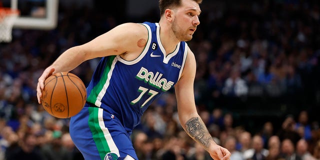 The Dallas Mavericks' Luka Doncic dribbles the ball during the second half of their NBA game at the American Airlines Center in Dallas Tuesday against the New York Knicks.