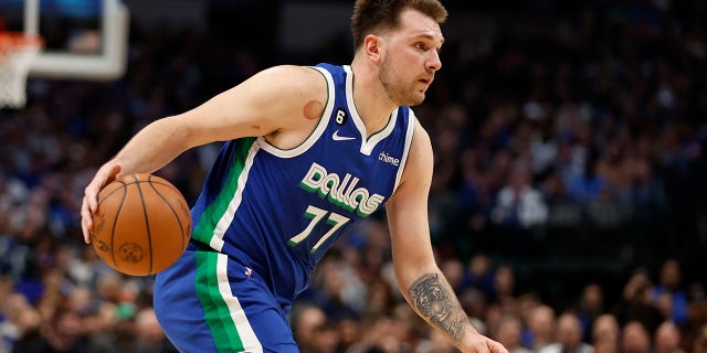 Luka Doncic of the Dallas Mavericks dribbles the ball against the New York Knicks in the second half of their NBA game at American Airlines Center in Dallas on Tuesday.
