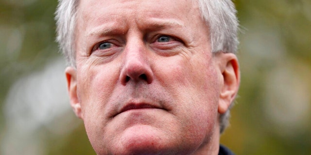 FILE - White House chief of staff Mark Meadows speaks with reporters outside the White House, Oct. 26, 2020, in Washington. 