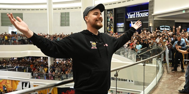 Global YouTube star MrBeast poses with fans at the launch of the first physical MrBeast Burger Restaurant at American Dream on Sept. 4, 2022, in East Rutherford, New Jersey. 