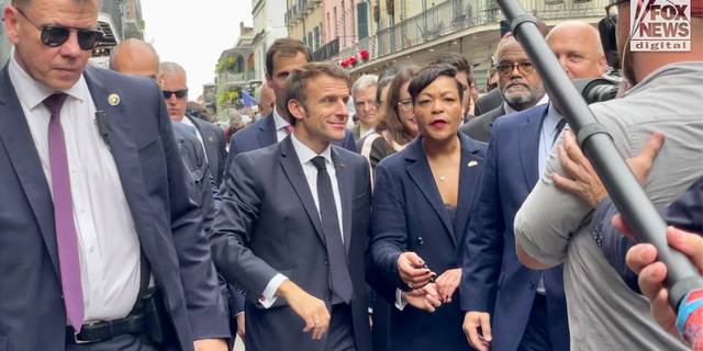 French President Emmanuel Macron pictured with controversial New Orleans Mayor LaToya Cantrell in the French Quarter during a diplomatic tour in December 2022.