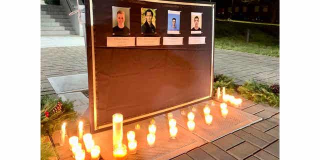 A memorial held at Maine Maritime Academy in Castine, Maine, on Dec. 11, 2022, honors four students who died in an SUV crash just off campus. 