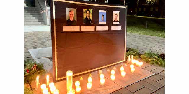 A memorial held at Maine Maritime Academy in Castine, Maine, on Dec. 11, 2022, honors four students who died in an SUV crash just off campus.