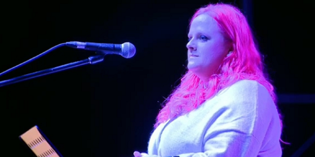 Maitlyn Gandy, Athena Strand's mother, addresses a crowd Tuesday at a candlelight vigil in Paradise, Texas.