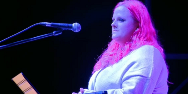 Maitlyn Gandy, Athena Strand's mother, addresses a crowd at a candlelight vigil in Paradise, Texas, on Dec. 6, 2022.