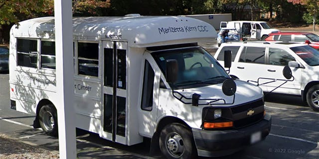 This undated images show a bus for the Marizetta Kerry Child Development Center in the parking lot of the Charlotte, North Carolina, daycare as depicted on Google Maps street view. 
