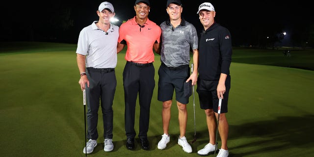 (L-R) Rory McIlroy of Northern Ireland and Tiger Woods of the United States pose with Jordan Spieth of the United States and Justin Thomas of the United States after Spieth and Thomas defeated McIlroy and Woods during The Match 7 at Pelican at Pelican Golf Club on December 10, 2022 in Belleair, Florida.