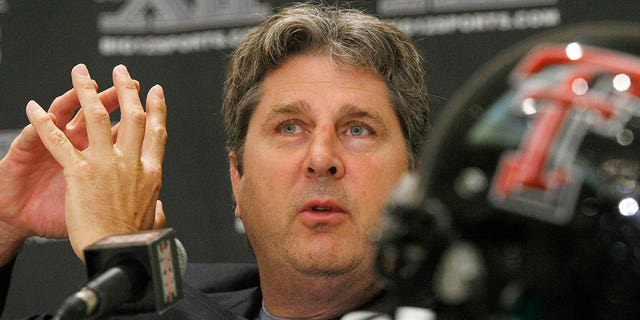 Texas Tech head football coach Mike Leach talks about the quarterback position during the Big 12 media day in Irving, Texas, on Wednesday, July 29, 2009. 