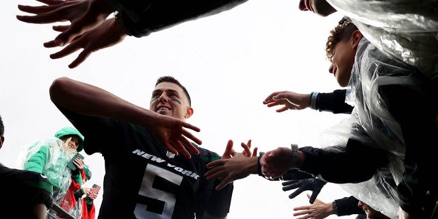 Mike White of the New York Jets celebrates after beating the Chicago Bears 31-10 at MetLife Stadium on Nov. 27, 2022, in East Rutherford, New Jersey.