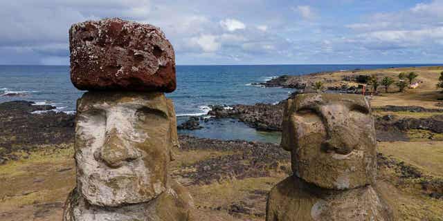 Damaged moai statues stand on Ahu Tongariki, Rapa Nui, Chile, on Nov, 27, 2022. Each of the moai statues represent an ancestor of the Rapanui people. 