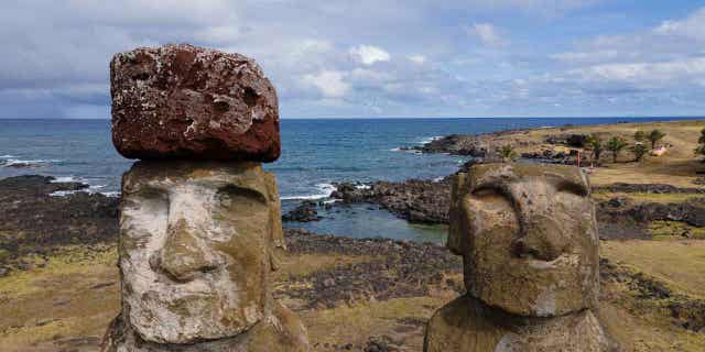 Damaged moai statues stand on Ahu Tongariki, Rapa Nui, Chile, on Nov, 27, 2022. Each of the moai statues represent an ancestor of the Rapanui people. 