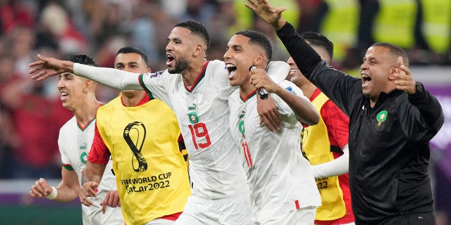 Morocco celebrates after defeating Canada in a group F World Cup match at the Al Thumama Stadium in Doha, Qatar on Thursday, Dec. 1, 2022.
