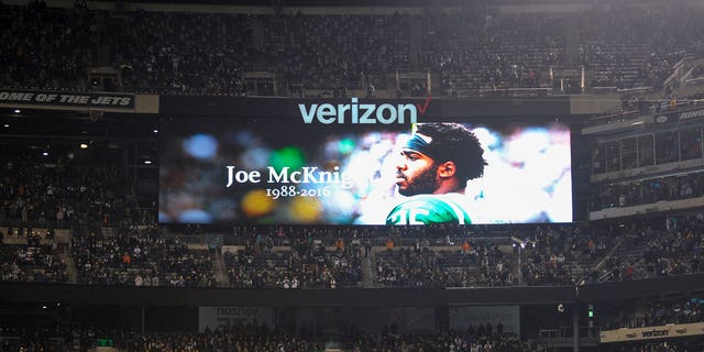 A monitor shows an image of former New York Jets player Joe McKnight, who was killed on Dec. 1, 2016, during a moment of silence prior to an NFL football game between the New York Jets and the Indianapolis Colts on Dec. 5, 2016, in East Rutherford, N.J.