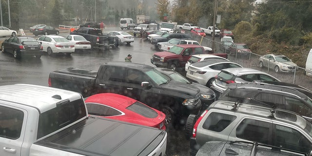 The parking lot at Northwest Armory was packed on Nov. 25, 2022, as Oregonians rushed to buy guns and ammunition magazines.