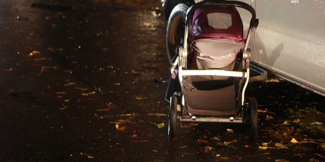 A stroller at the scene where a mother and four children were hit by a car that took off on Nov, 30, 2022. 