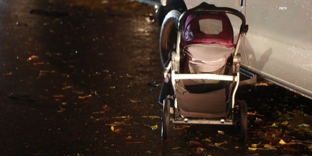 A stroller at the scene where a mother and four children were hit by a car that took off on Nov, 30, 2022. 