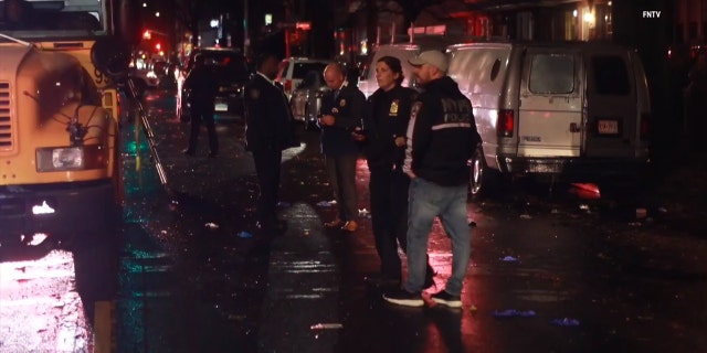 People at the scene of a hit-and-run accident in Brooklyn, New York on Nov. 30, 2022. 