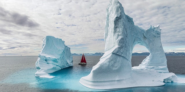 Five weeks into the journey of the National Geographic expedition ship Polar Sun, photographer Renan Ozturk found himself exploring a bay off the coast of Greenland. The boat played peekaboo with pale blue icebergs as Ozturk readied his camera drone and held his breath.