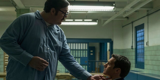 Cameron Britton, left, as Ed Kemper in the Netflix true-crime series "Mindhunter."