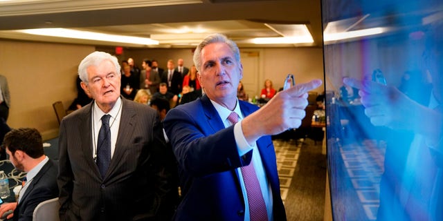 Former House Speaker Newt Gingrich, left, and House Minority Leader Kevin McCarthy watch election results at the Madison Hotel in Washington, D.C., on Nov. 8, 2022.