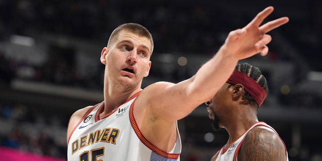 Denver Nuggets center Nikola Jokic gestures after being called for a foul in the second half of a game against the Charlotte Hornets Dec. 18, 2022, in Denver.