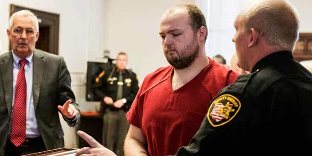 George Wagner IV, center, is escorted out of the courtroom after his arraignment on Nov. 28, 2018, at the Pike County Courthouse, in Waverly, Ohio. Walker faces the possibility of life in prison without parole when he is sentenced Dec. 19, 2022.