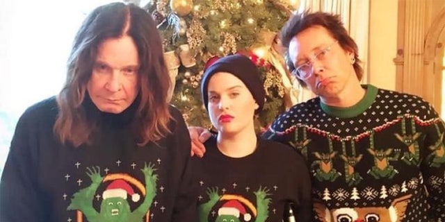 Ozzy is celebrating Christmas in his own way, by wearing a Grinch inspired Christmas sweater.