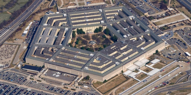 FILE - The Pentagon is seen from Air Force One as it flies over Washington, March 2, 2022. A new Pentagon office set up to track reports of unidentified flying objects has received "several hundreds" of new reports, but no evidence so far of alien life. That's according to the leadership of the All-domain Anomaly Resolution Office.  