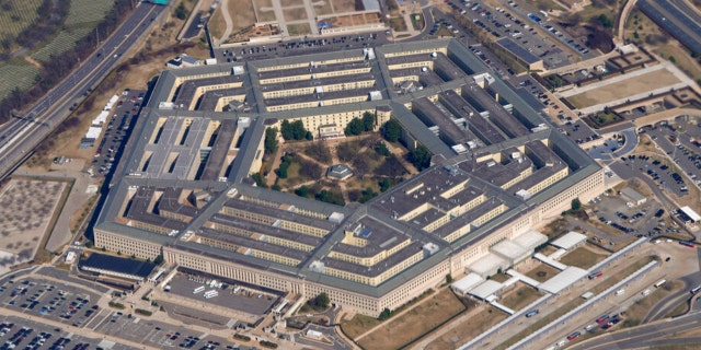 FILE - The Pentagon is seen from Air Force One as it flies over Washington, March 2, 2022. A new Pentagon office set up to track reports of unidentified flying objects has received "several hundreds" of new reports, but no evidence so far of alien life. That's according to the leadership of the All-domain Anomaly Resolution Office.
