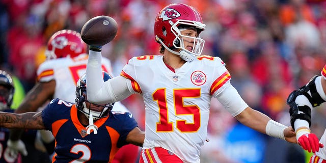 Kansas City Chiefs quarterback Patrick Mahomes throws during the first half against the Denver Broncos, Sunday, Dec. 11, 2022, in Denver.