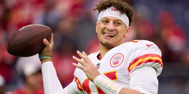 Patrick Mahomes, #15 of the Kansas City Chiefs, warms up before kickoff against the Houston Texans at NRG Stadium on Dec. 18, 2022 in Houston.
