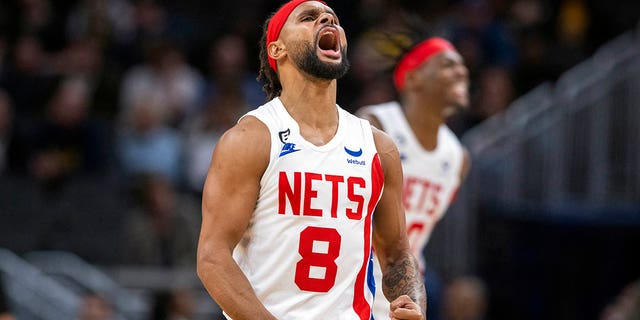 Brooklyn Nets guard Patty Mills (8) reacts during the second half of an NBA basketball game against the Indiana Pacers in Indianapolis, Saturday, Dec. 10, 2022.