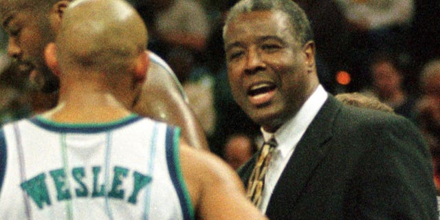 Charlotte Hornets new head coach Paul Silas speaks to David Wesley during a time-out March 9 during his debut at the Charlotte Coliseum. Silas was an assistant coach under Dave Cowens, who resigned March 7.