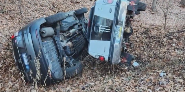 Carla Long's vehicle, left, is seen after a truck went off the road in the same location and crashed into it.