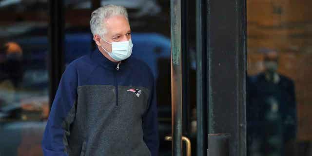 Former Harvard fencing coach Peter Brand departs federal court in Boston, on Nov. 16, 2020, after being arraigned. Opening statements are taking place on Dec. 5, 2022, in the case of the former Harvard fencing coach and a wealthy Maryland businessman on trial on accusations that the coach accepted bribes in exchange for helping the businessman get his two sons into the Ivy League school as recruited fencers. 