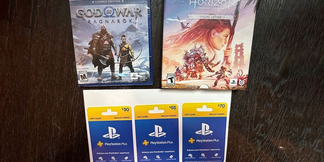 PlayStation games, including God of War and Horizon, with a few PlayStation gift cards.