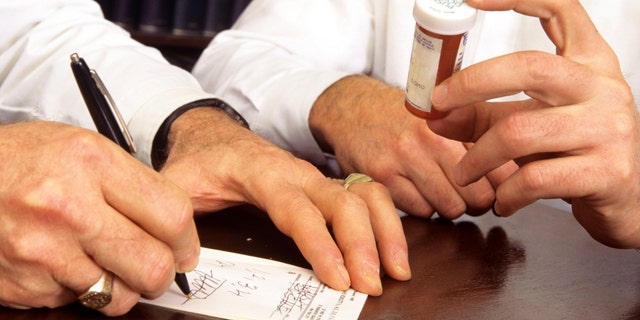 Doctor writes refill prescription