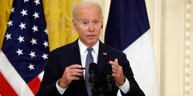 President Biden speaks during a joint press conference with French President Emmanuel Macron in the East Room of the White House on Dec. 1, 2022.