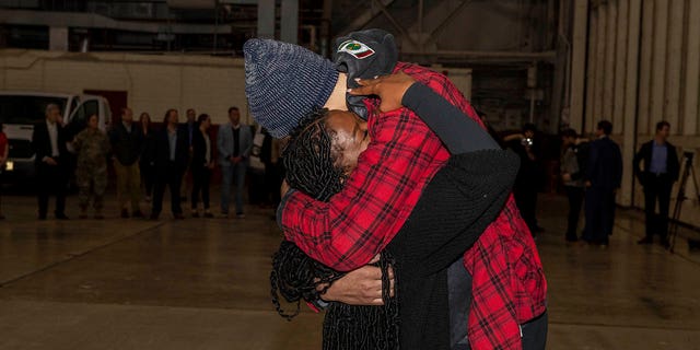 Brittney Griner hugs his wife Cherelle after being released from a Russian jail.