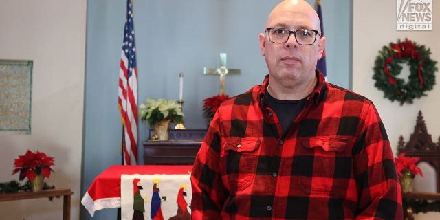 Reverend Brian Fellows inside Clifton Springs United Methodist church in Rochester, NY on December 13, 2022.